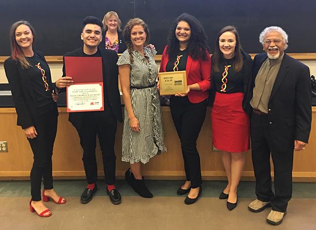 The student presenters at the competition in a group shot.